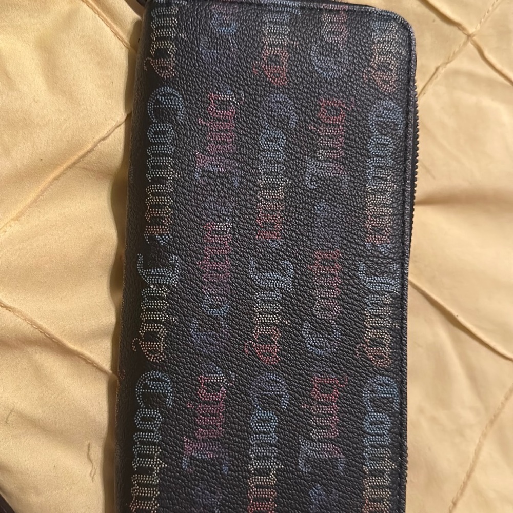 Juice couture black with nice colors good size